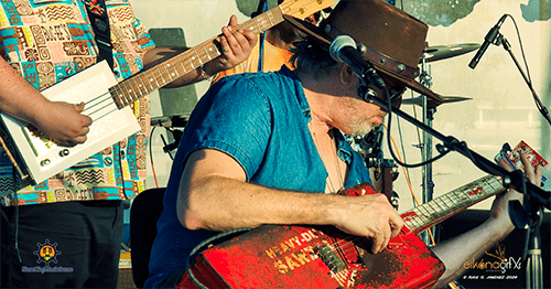 picture of man playing guitar